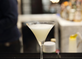 White cocktail in bar background