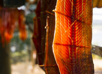 Meat is cut and hanged to dry outdoors in the lodge